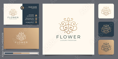 creative flower abstract line style logo with business card template. luxury fashion floral logo.