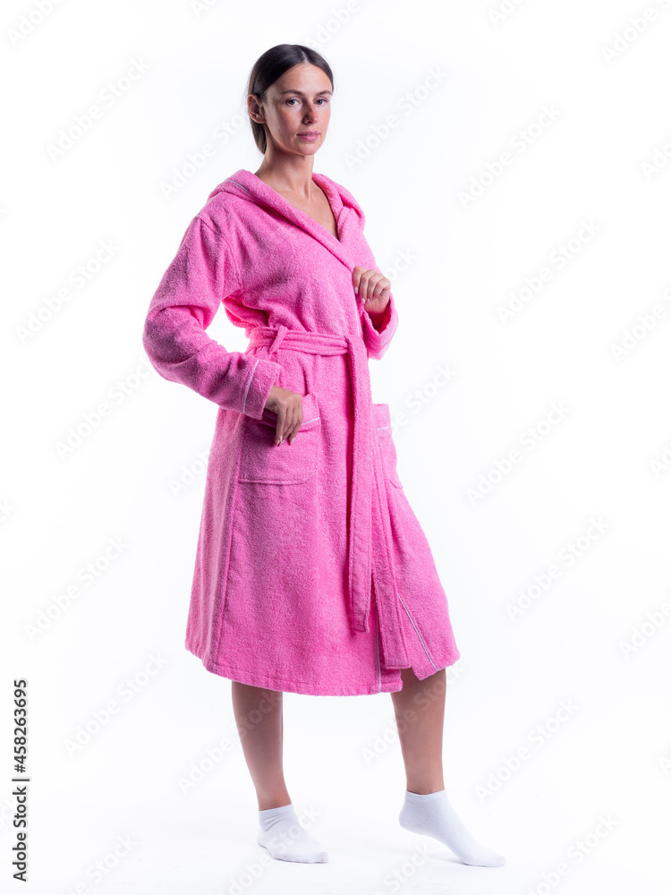 woman in a Bathrobe on an isolated white background with a smile on her face. woman in a Bathrobe on an isolated white background with a smile on her face.
