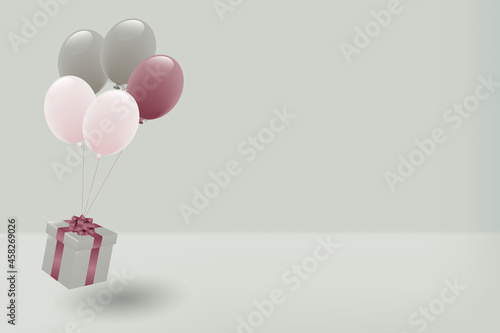 くすみカラーの風船とプレゼントボックス