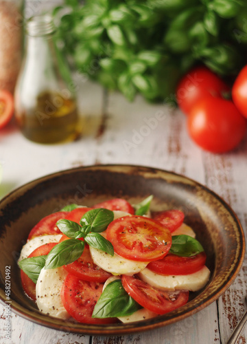 A bowl with traditional Italian caprese salad