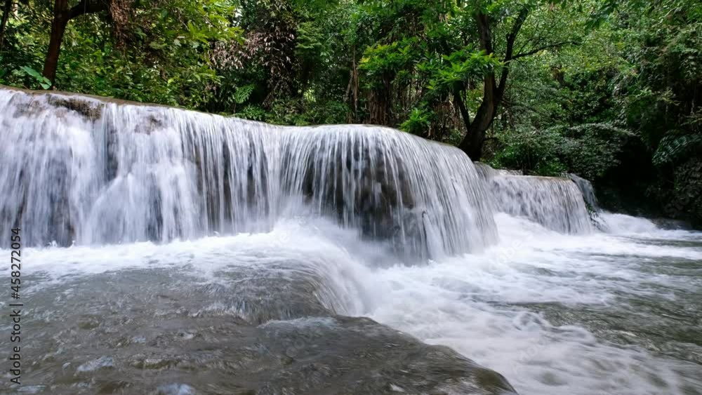 Scenic view of Huay Mae Khamin Waterfall in tropical rainforest Scenic view of Huay Mae Khamin Waterfall in tropical rainforest