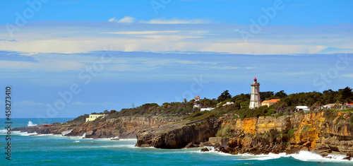 Guia Lighthouse on the Rocky Coast near Cascais, Portugal