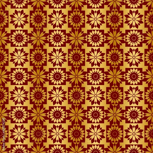 Red gold seamless pattern with regular embellishments..Background like luxury wrapping paper..Design for printing paper as a gold background.