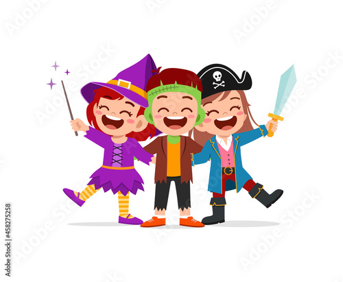 cute little boy and girl celebrate halloween with friend