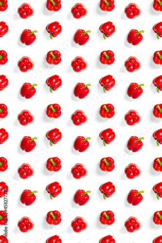 Bulgarian red ripe pepper on white backdrop. background from paprika, flat lay not seamless pattern