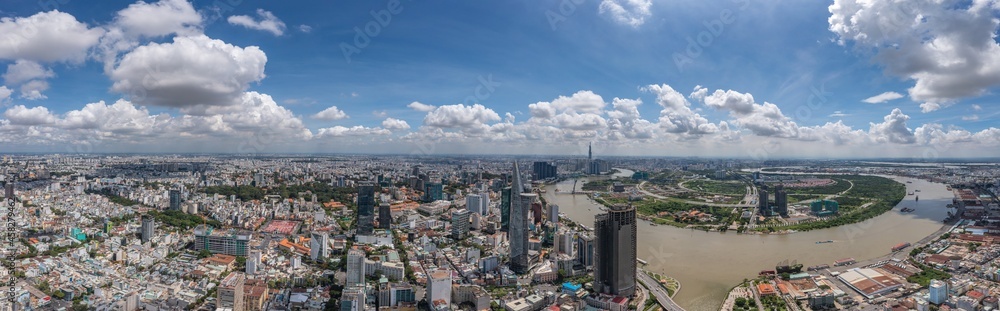 Panoramic photo of Ho Chi Minh city and Saigon river in the cloudy day