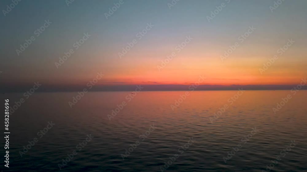 Sunset over Lake Michigan. Push forward with smooth 4k drone. Sunset over Lake Michigan. Push forward with smooth 4k drone.