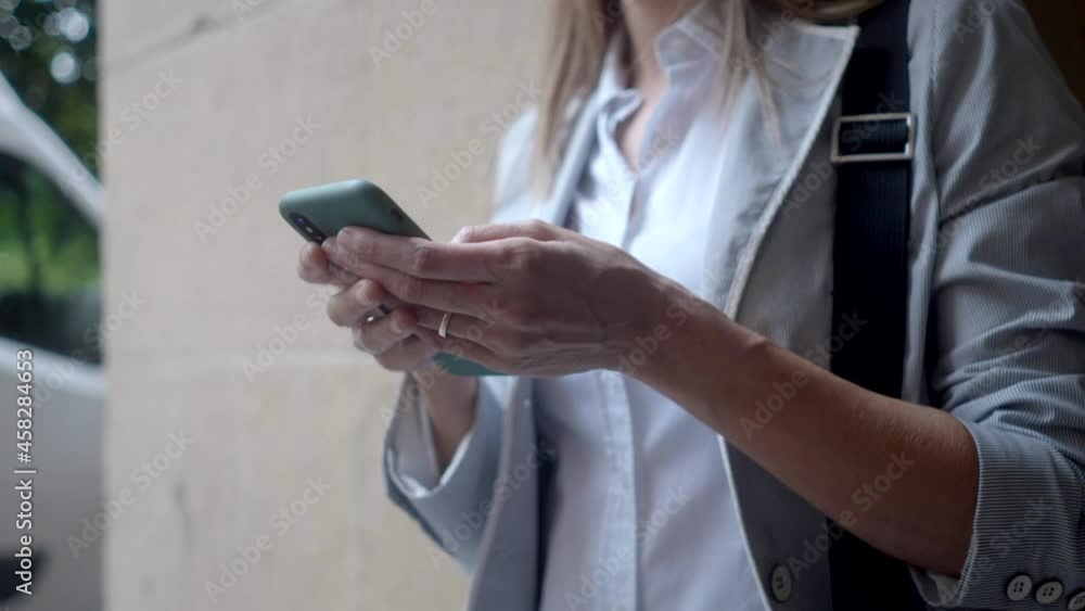 young businesswoman working on her cell phone young businesswoman working on her cell phone
