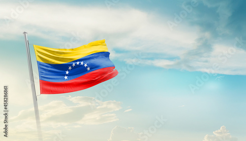 Venezuela national flag cloth fabric waving on the sky - Image