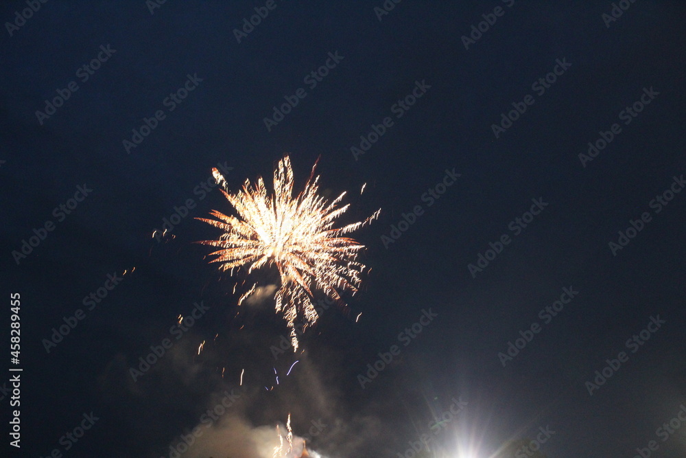fireworks salute white on a dark black background holiday Christmas new year atmosphere