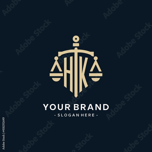 HK initial logo with scale of justice and shield icon
