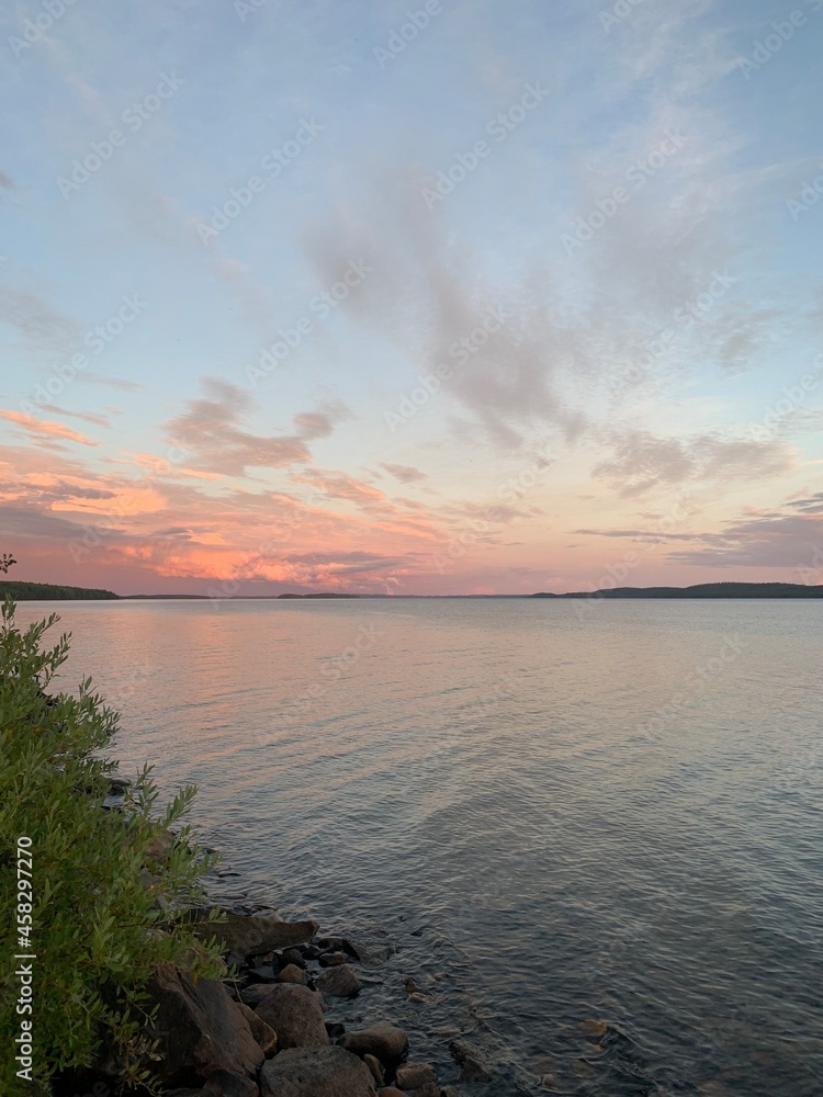 Naklejka premium sunset over the lake Maslozero Karelia Russia