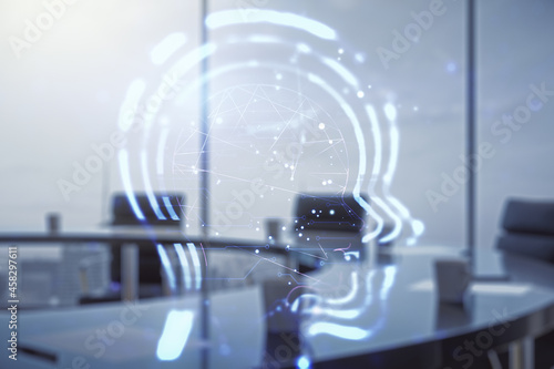 Abstract virtual artificial Intelligence interface with human head hologram on a modern conference room background. Multiexposure