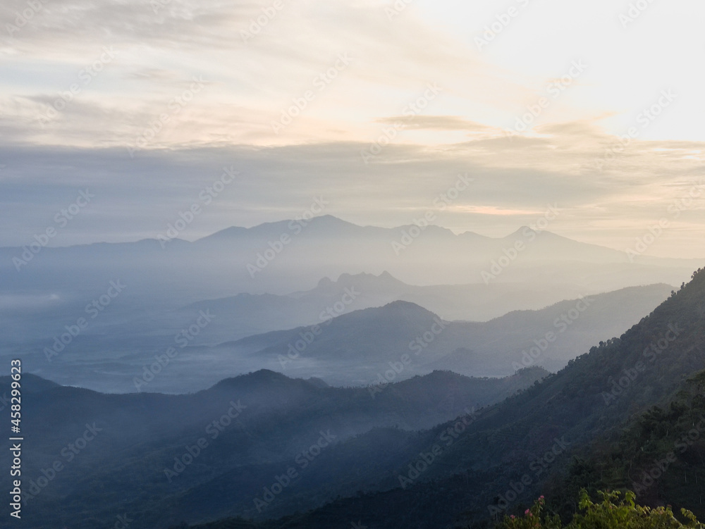 a mountain range view in the morning. the view while waiting for the sun to rise from the east. beautiful morning view in the mountain.