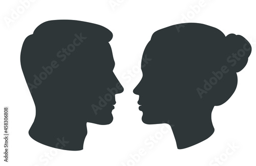 Vector silhouette of man and woman heads face to face in profile. Portrait of young beautiful girl, boy looking side. Close up isolated illustration on white. © mozart3737