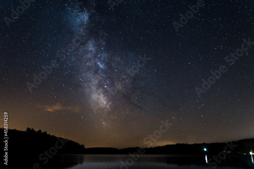 Milky way above Neuvic Lake in Correze, France, Summer 2021