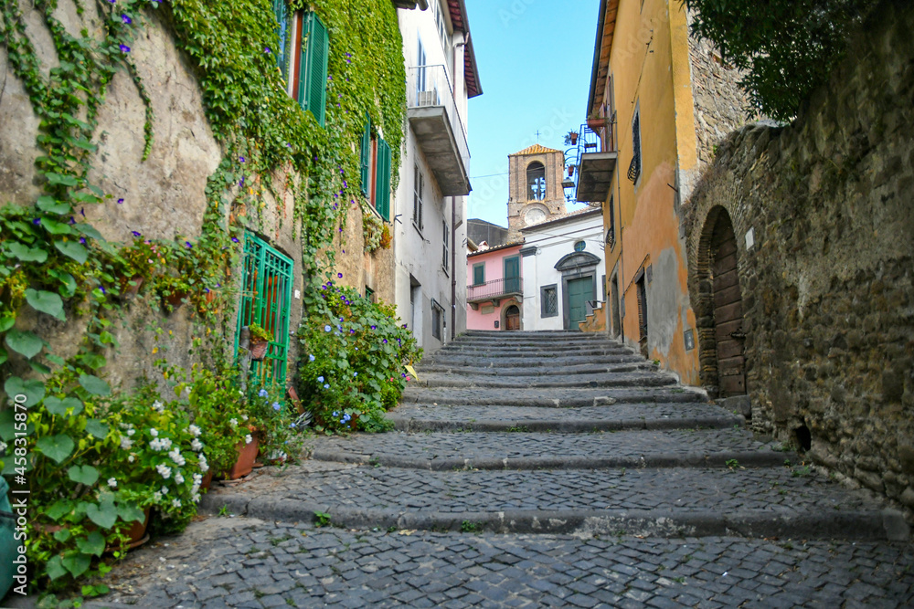 Obraz premium A narrow street in Anguillara sabazia, an old town in Lazio region, Italy.