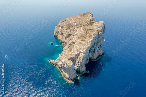 Aerial view of Isola di Foradada island in Alghero district in Sardinia.