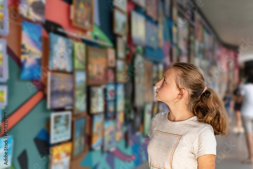 Wallpaper Mural The girl in the art museum looks at the art gallery. Torontodigital.ca