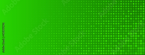 Abstract halftone background made of small square dots of different sizes in green colors