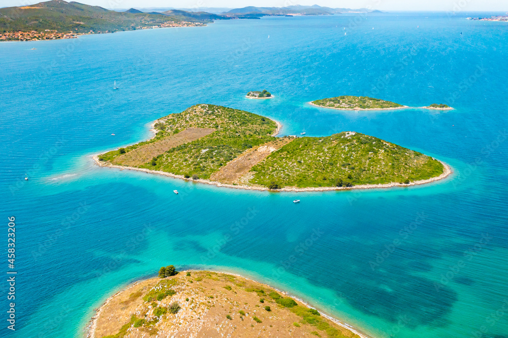 Aerial view of heart shape island Galesnjak in Dalamatia near Zadar, Croatia. Transparent and turquoise blue water of Adriatic sea 