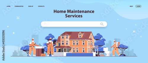 mix race professional repairmen in uniform making house renovation home maintenance repair service concept