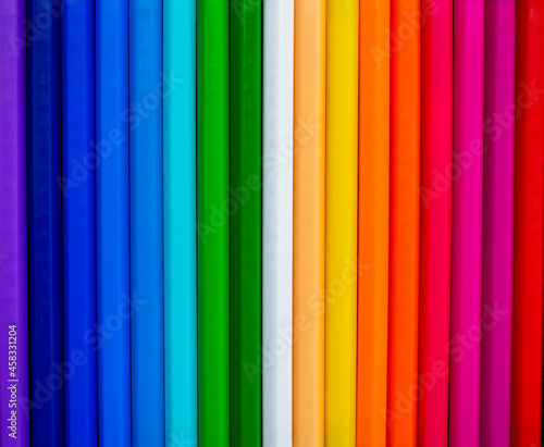 bright rainbow background from multicolored pencils
