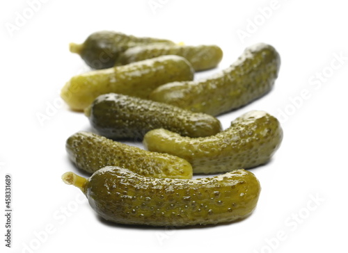Pickled gherkin pile, pickles isolated on white background