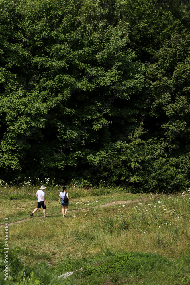 people walking in the forest people walking in the forest