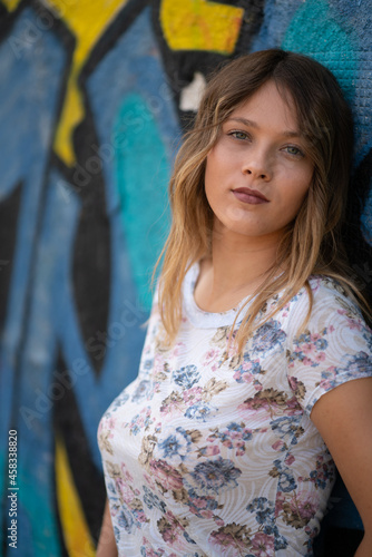 Natural Looking Young Beautiful Woman with Hazel eyes posing in abandoned building, no post editing