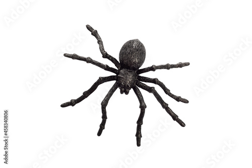 Leinwand Poster Black rubber spider toy isolated on a white background