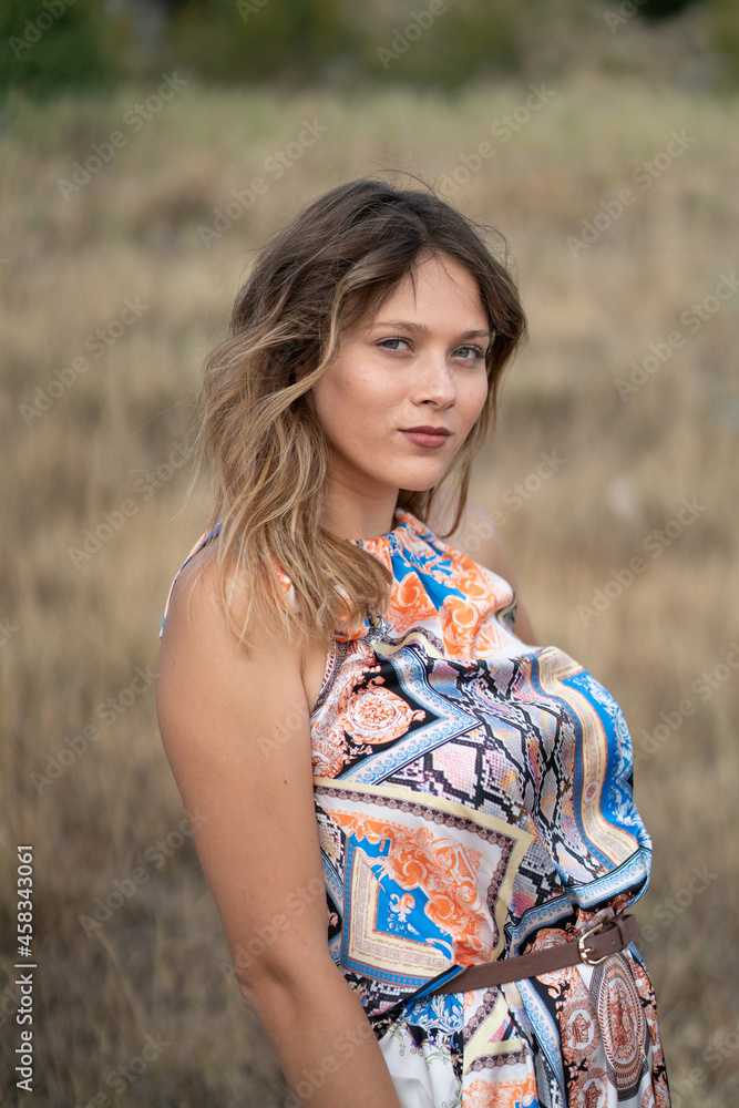 Natural Looking Young Beautiful Woman with Hazel eyes posing in the fields, no post editing Natural Looking Young Beautiful Woman with Hazel eyes posing in the fields, no post editing