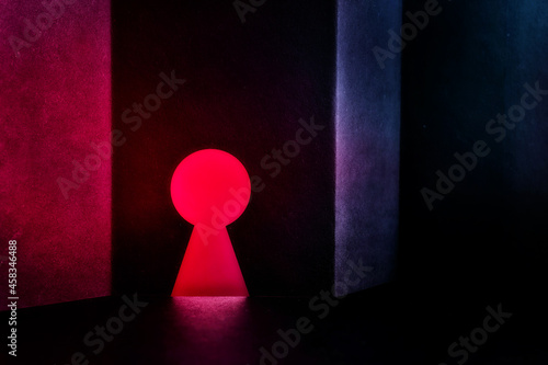 abstract textured wall with keyhole dark neon lights photo