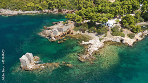 Aerial drone photo of famous bay and small traditional village of Atsitsa covered in pine trees and natural sandy beaches, Skiros island, Sporades, Greece © aerial-drone