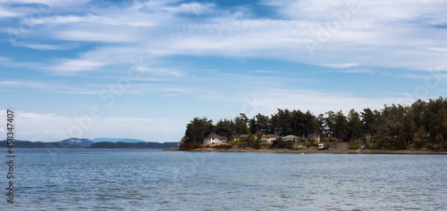View of a scenic shore on the west coast of pacific ocean during a sunny summer day. Roberts Bay, Sidney, Vancouver Island, British Columbia, Canada. © edb3_16