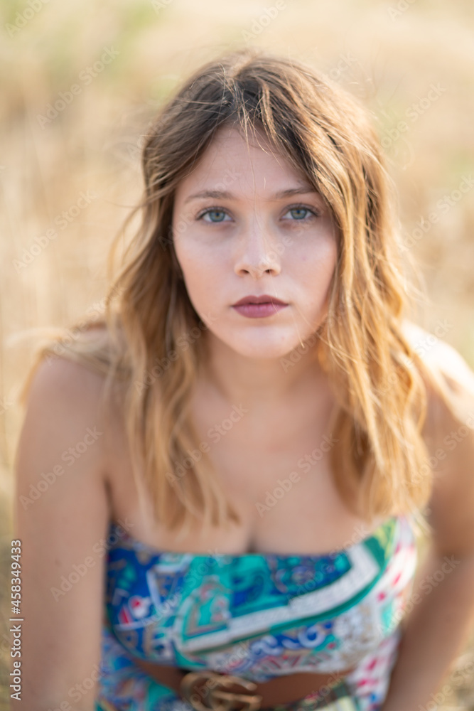 Natural Looking Young Beautiful Woman with Hazel eyes posing in the fields, no post editing Natural Looking Young Beautiful Woman with Hazel eyes posing in the fields, no post editing