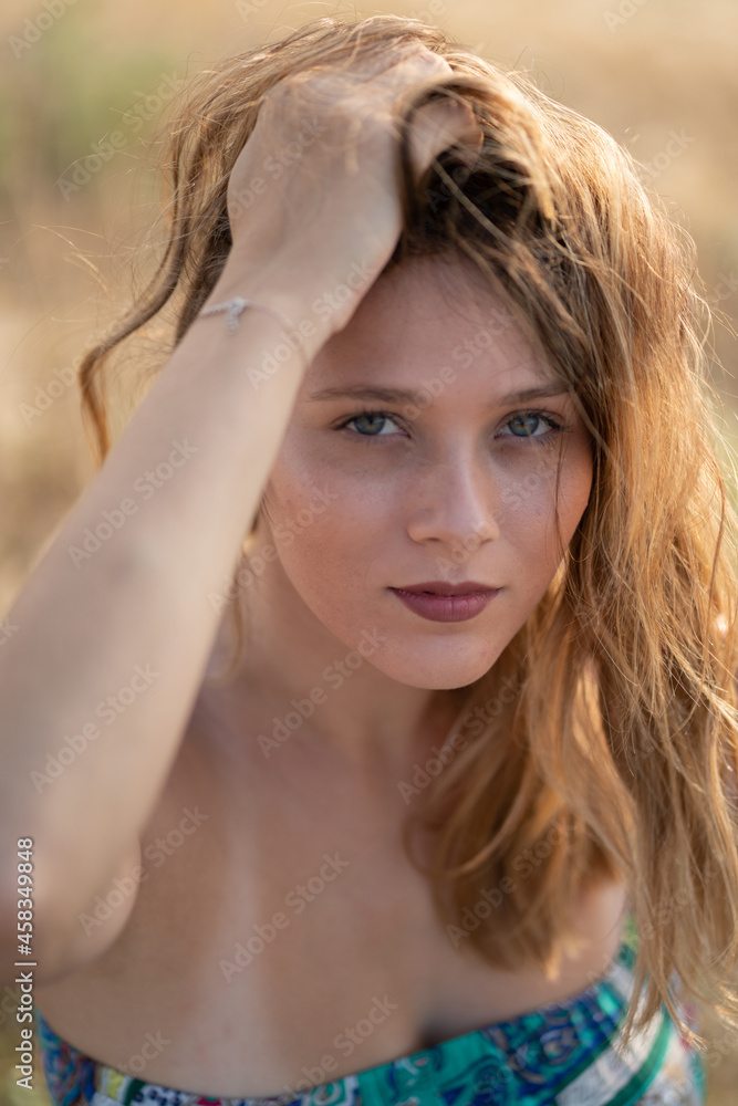 Natural Looking Young Beautiful Woman with Hazel eyes posing in the fields, no post editing Natural Looking Young Beautiful Woman with Hazel eyes posing in the fields, no post editing