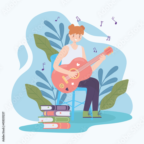 girl practicing guitar