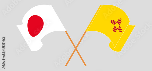 Crossed and waving flags of Japan and the State of New Mexico