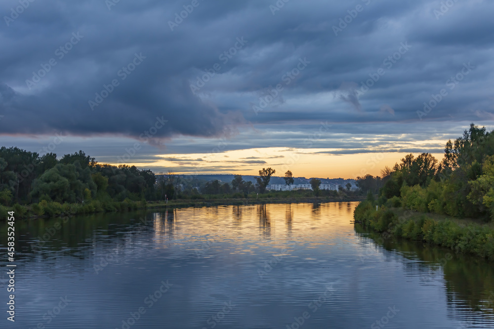 Scenic river landscape with green trees in early autumn Scenic river landscape with green trees in early autumn