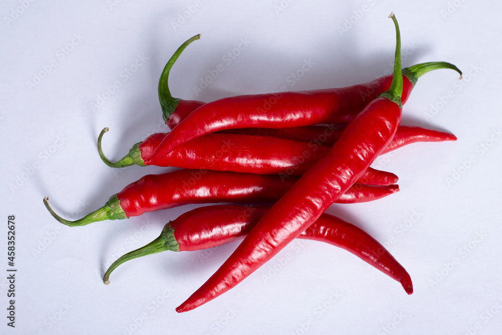  red chilli peppers isolated on white background