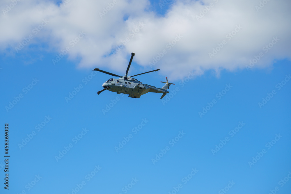 British Royal Navy Agusta-Westland Merlin HM.2 AW101 on a military exercise over Wiltshire UK British Royal Navy Agusta-Westland Merlin HM.2 AW101 on a military exercise over Wiltshire UK