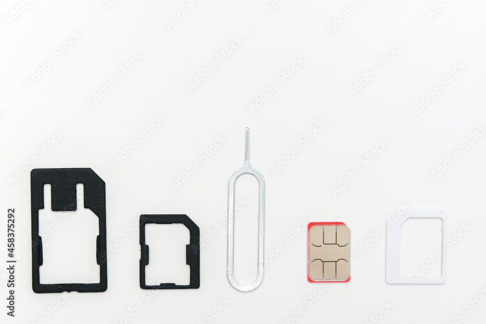 Sim card,sim card adapter, sim card eject tool for changing or removing, digital media put on white background Sim card,sim card adapter, sim card eject tool for changing or removing, digital media put on white background