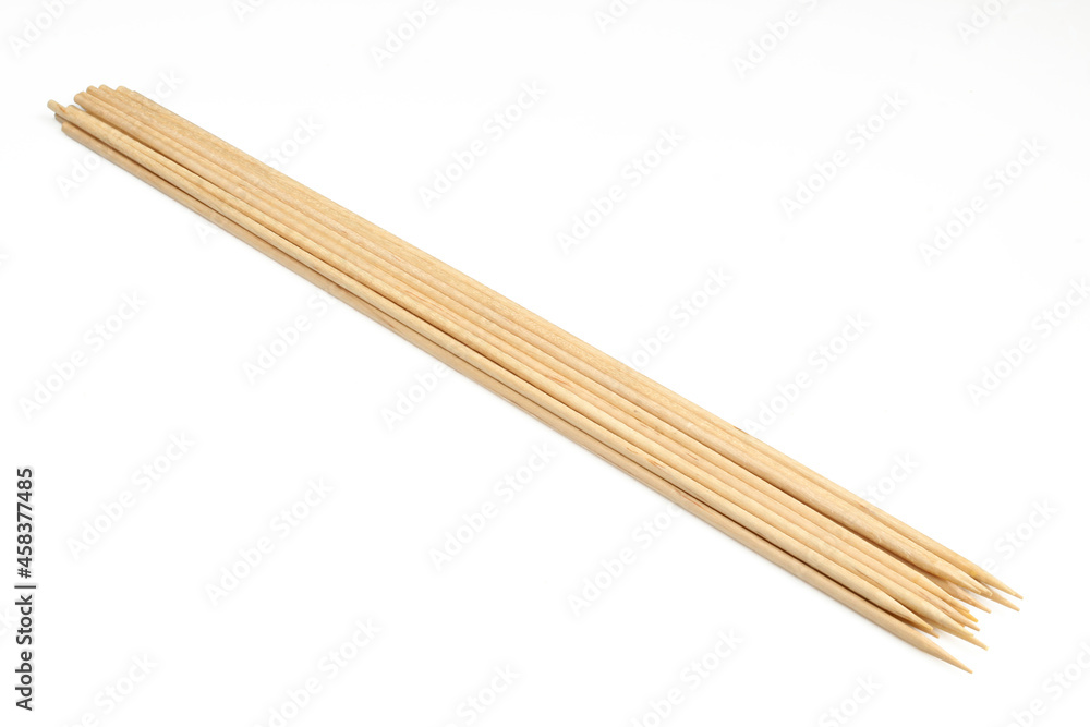 Collection of wooden skewer sticks isolated on white background