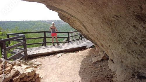 Woman in the cave on top of the panoramic lookout of the Krka National Park of Croatia. Sibenik-Knin County and central Dalmatia. photo