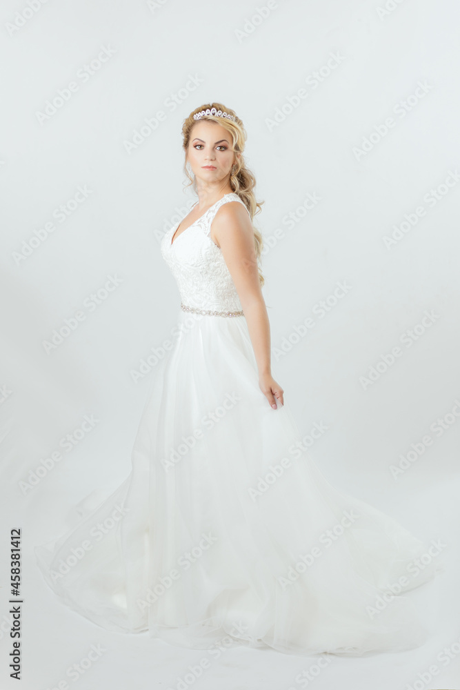 blonde caucasian bride on white dress bridal dress concept