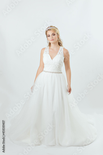 blonde caucasian bride on white dress bridal dress concept