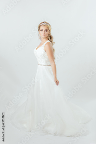 blonde caucasian bride on white dress bridal dress concept