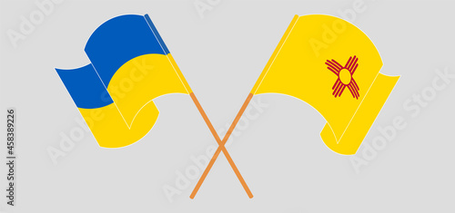 Crossed and waving flags of Ukraine and the State of New Mexico