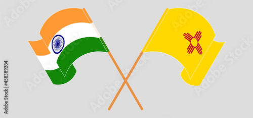Crossed and waving flags of the State of New Mexico and India